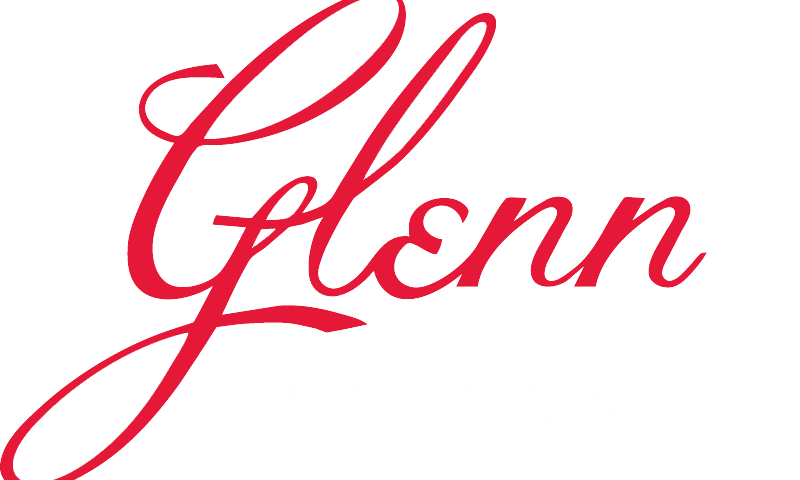 A red and white logo for glenn insurance.